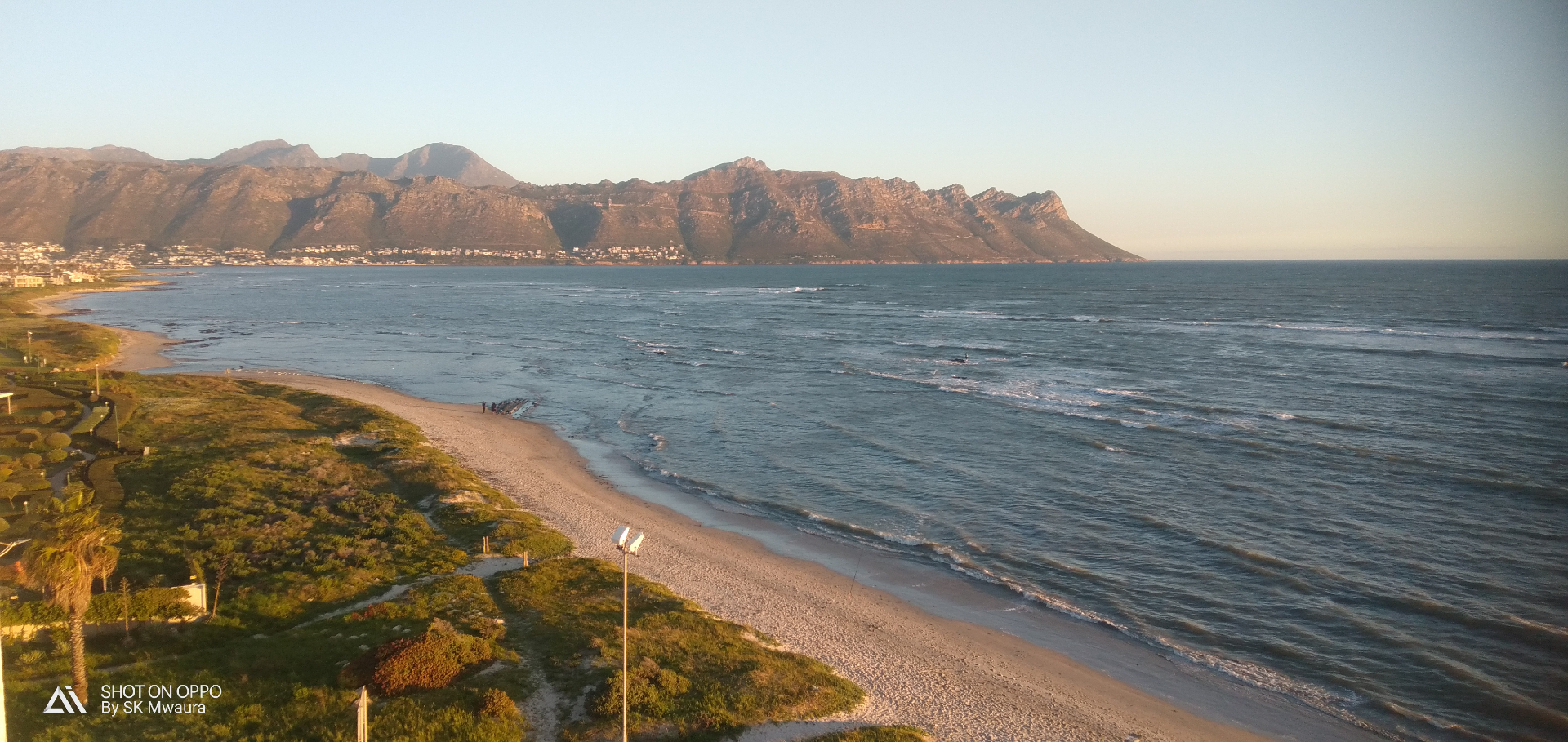 Cape Town beach with mountains at sunset