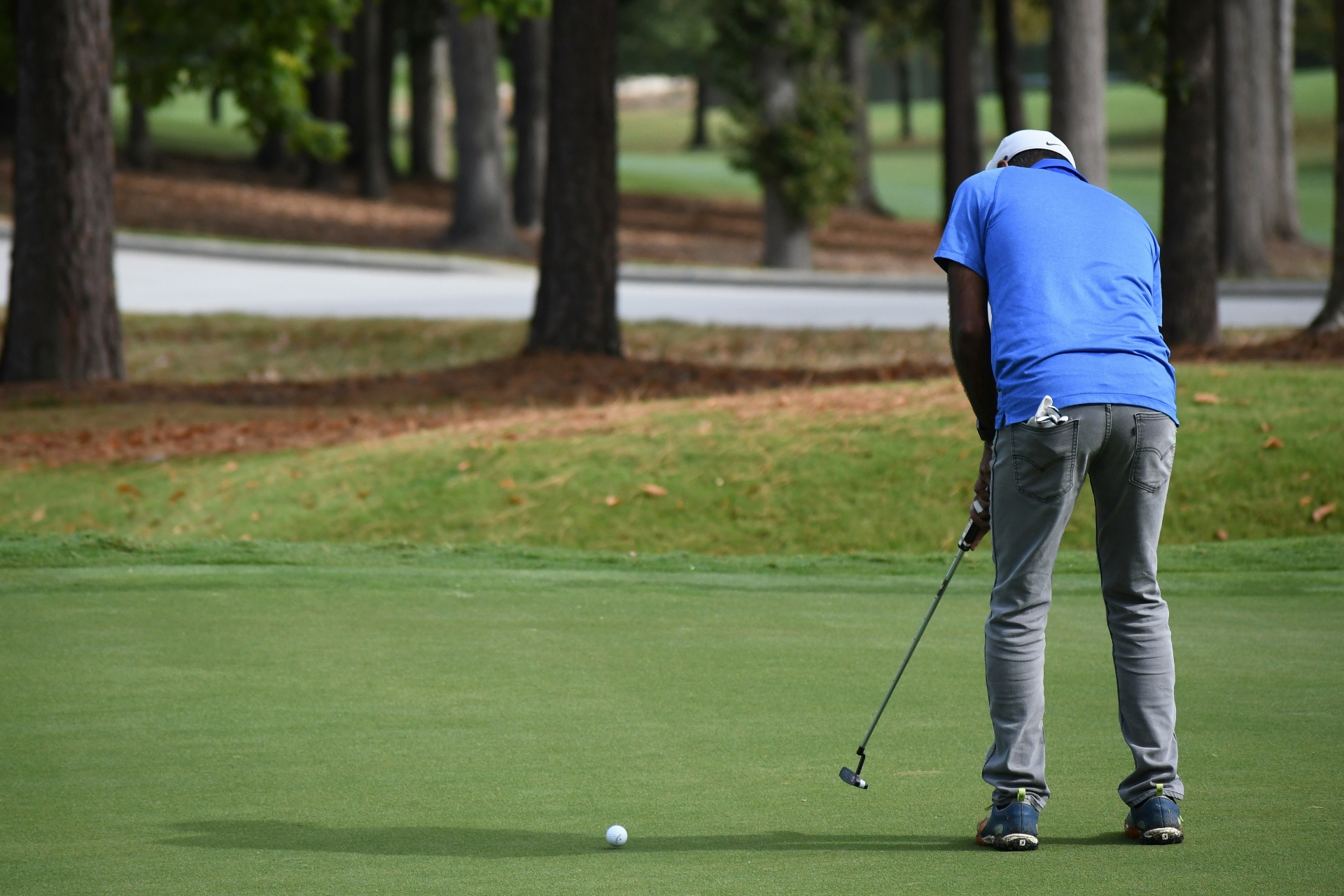 Player lining up a putt